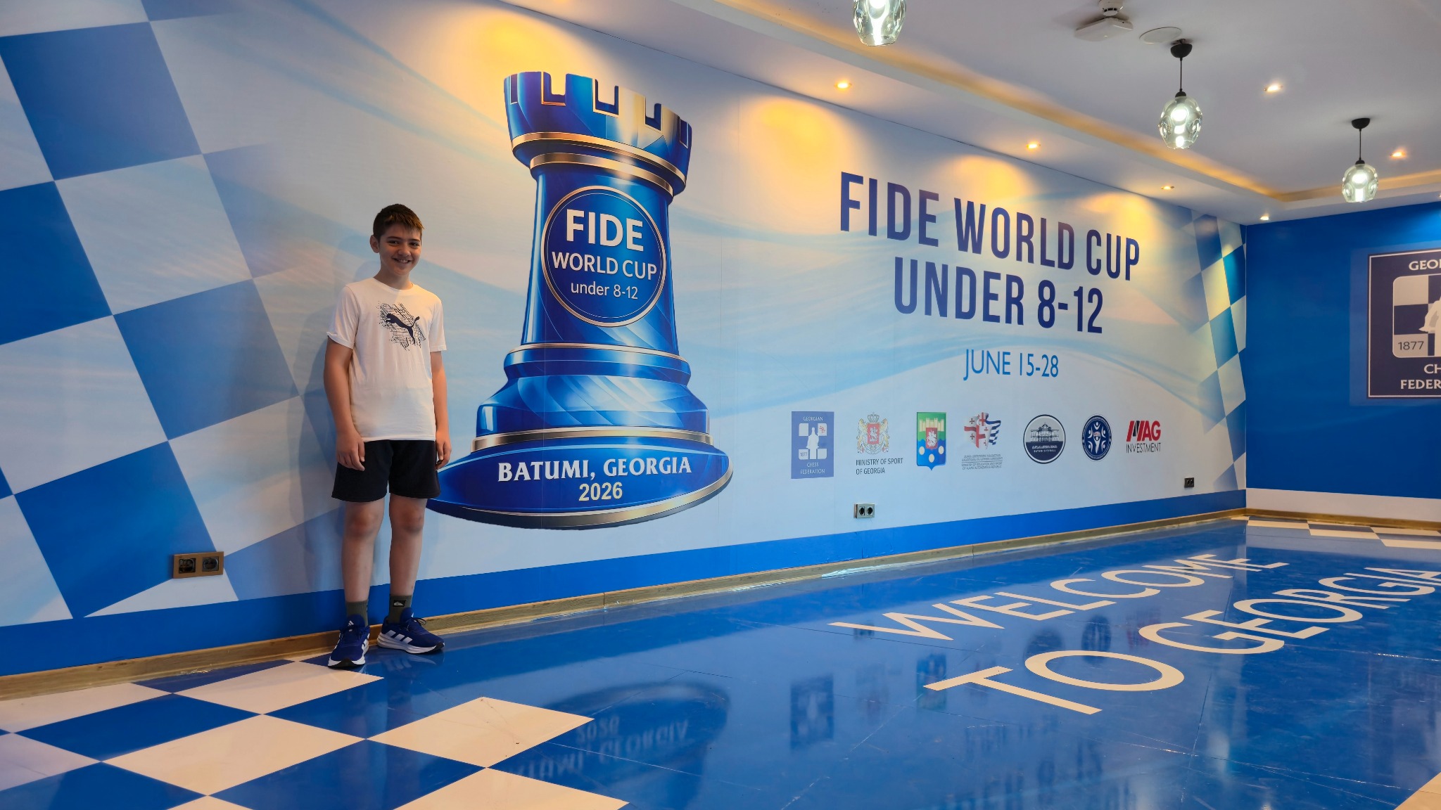 Marc Llari à Batoumi lors de la FIDE World Cup U12 2026, compétition qu’il remporte à 12 ans